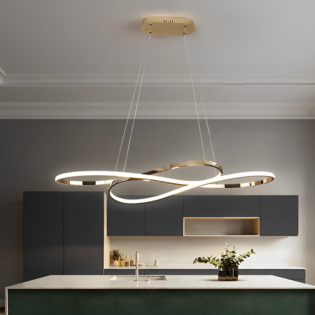 LED infinity chandelier illuminating kitchen island with warm glow.
