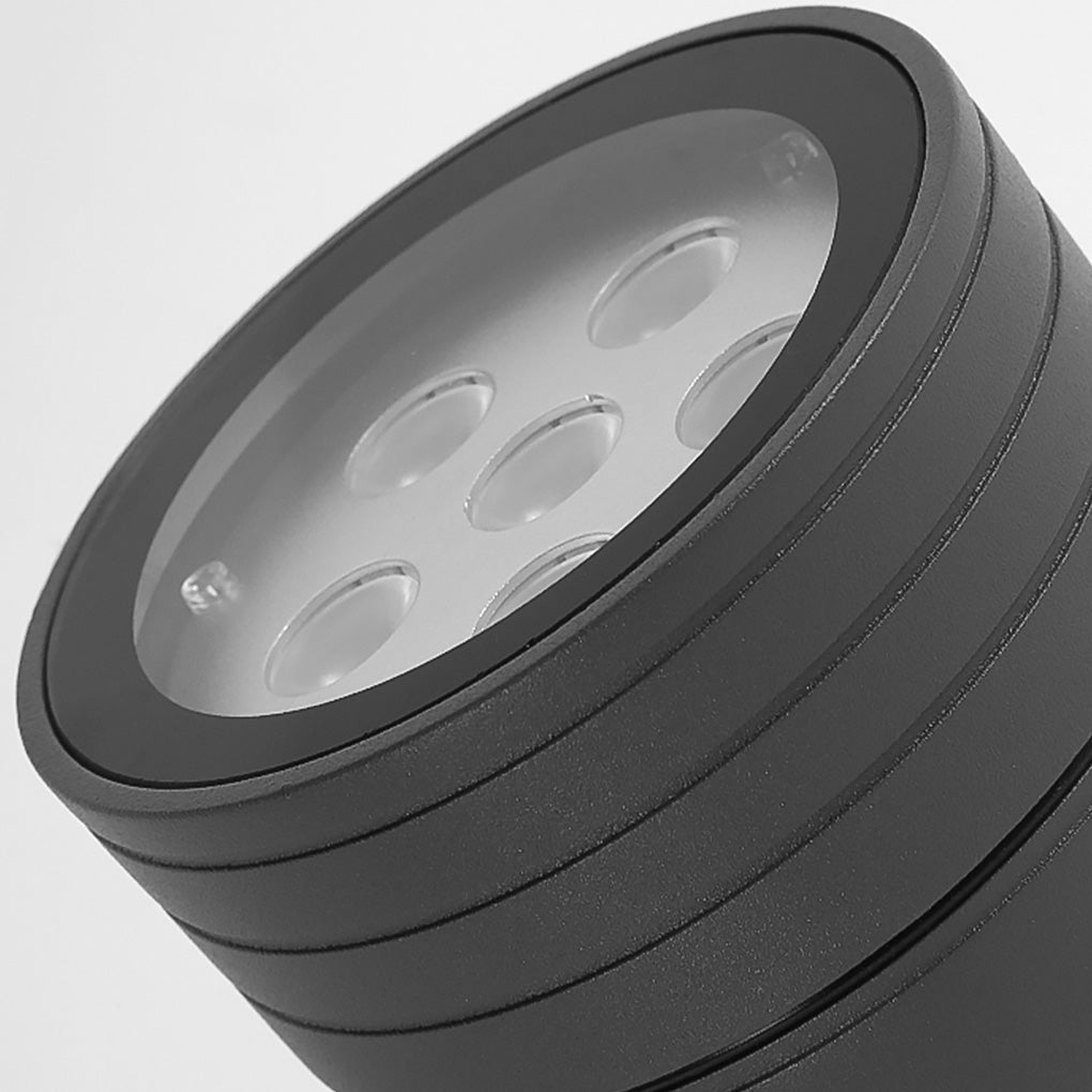 Close-up of LED landscape spot lights lens and housing, showcasing multiple LEDs and durable outdoor construction.