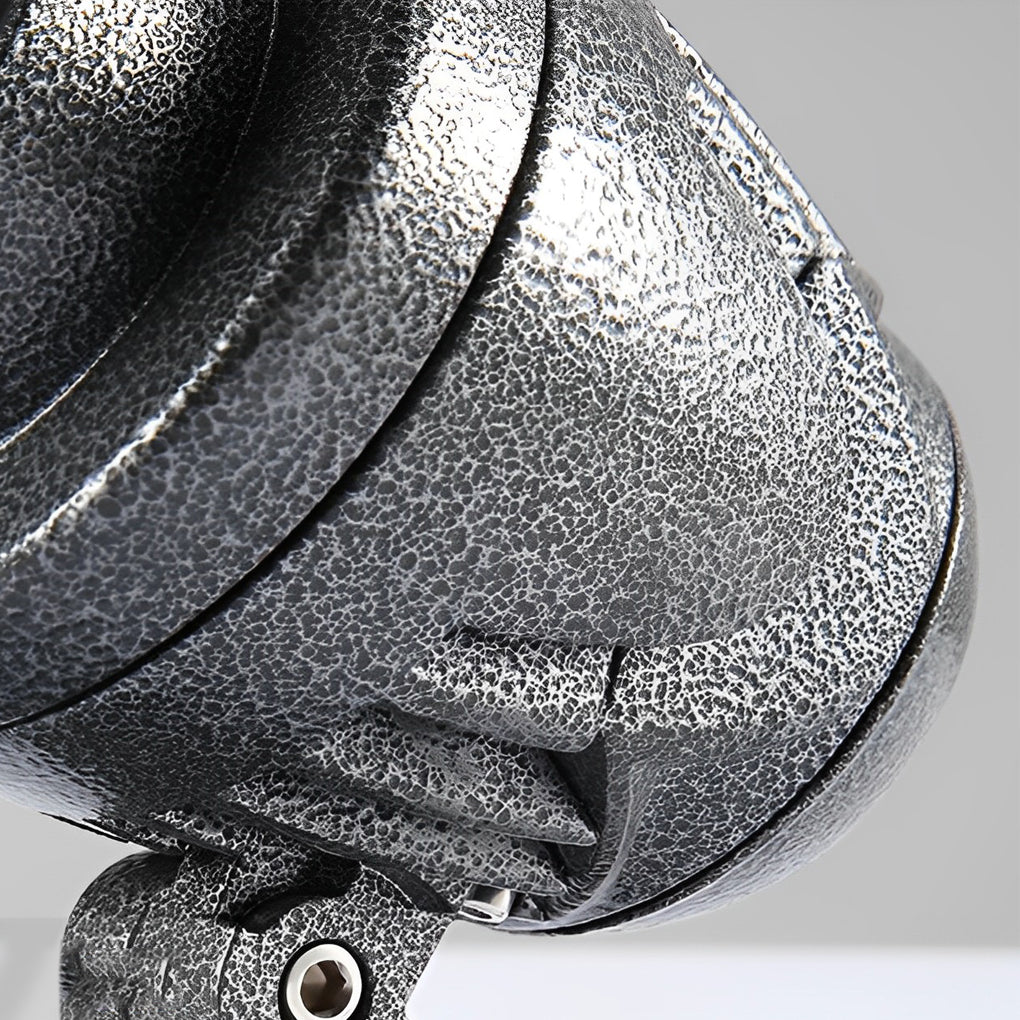 LED landscape spotlight housing close-up showing textured metal surface finish.