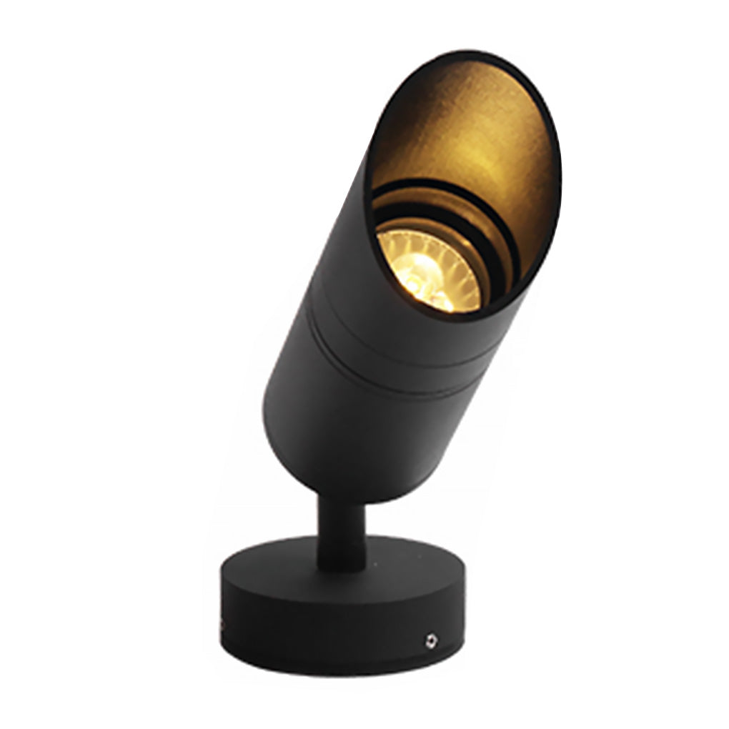 LED landscape spotlight with an angled hood and round base shown on white.