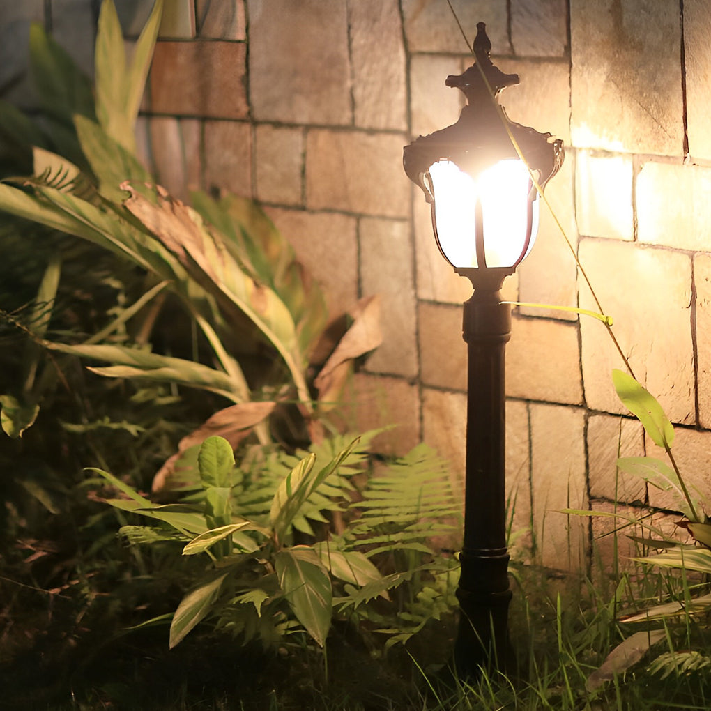 LED lawn lights enhancing a modern outdoor seating area with warm light.