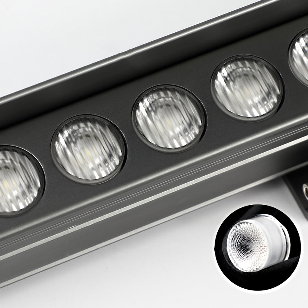 Close-up of LED lenses inside linear facade wall washer light fixture.