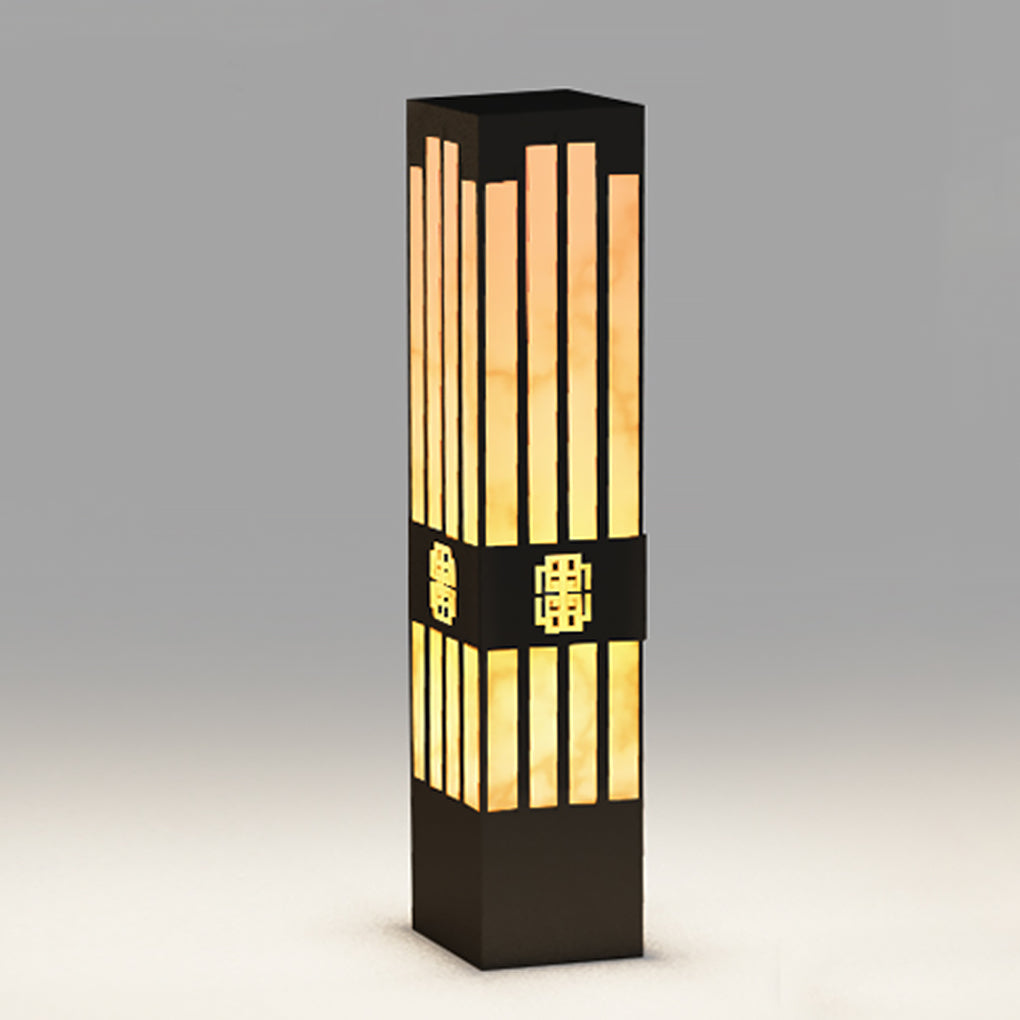 LED marble bollard light with a close-up of the geometric pattern and light effect.