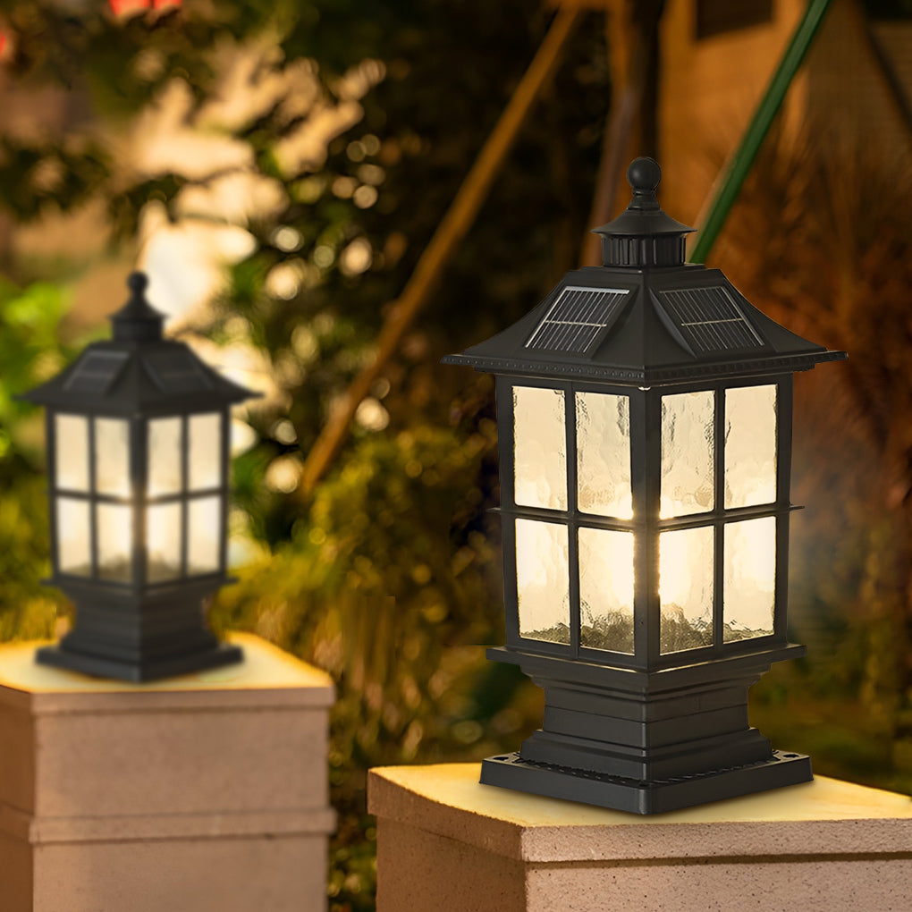 LED pillar lights illuminating a minimalist garden with focused glow.