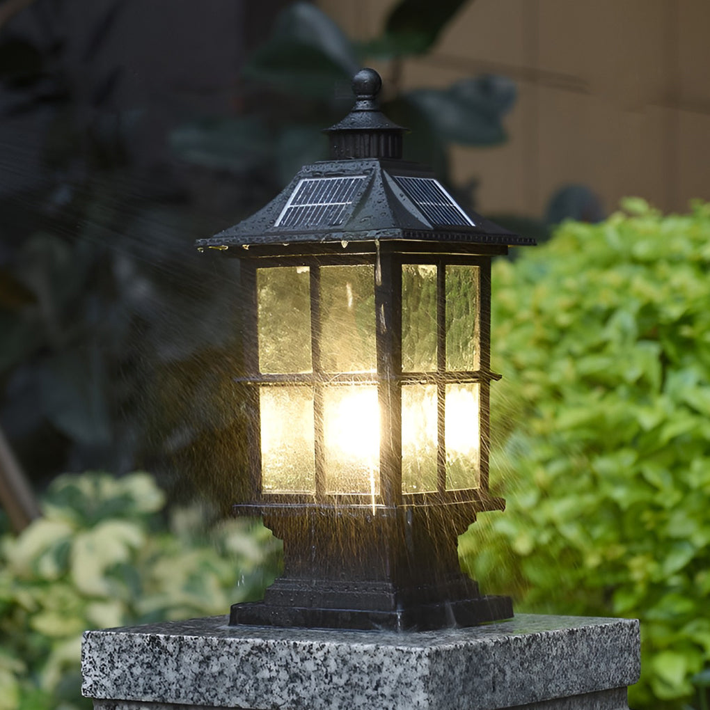 LED pillar lights enhancing a modern outdoor seating area with warm light.