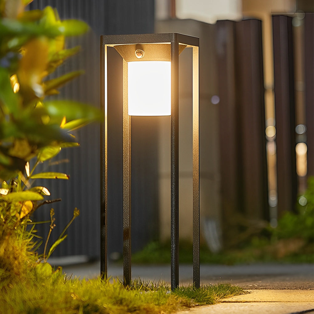 LED solar bollard lights enhancing a modern garden with sleek, sustainable design.