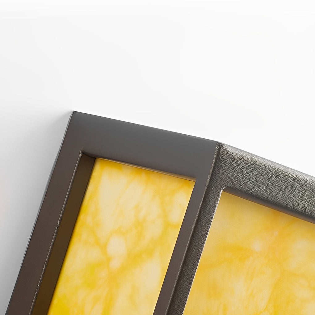 Lightbox wall lamp in gold, side view of the sleek design.