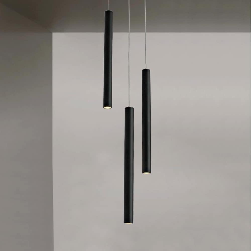 Linear cluster pendant light featuring black cylindrical pendants arranged for modern interior lighting.
