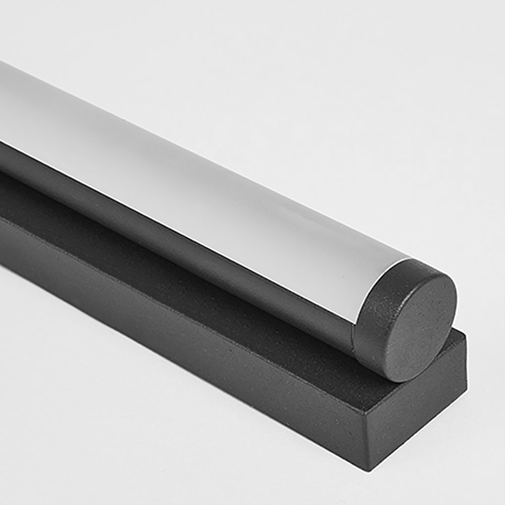 Long strip ceiling light with a white finish, providing soft light in a modern room.