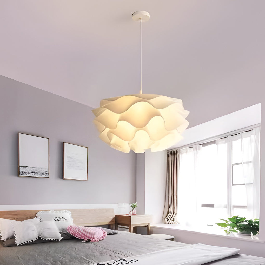 Lotus flower pendant light enhancing a contemporary living room with elegant design.