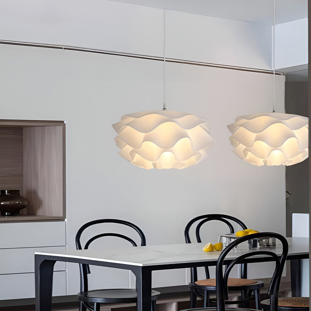 Lotus flower pendant light enhancing a minimalist bedroom with warm light.