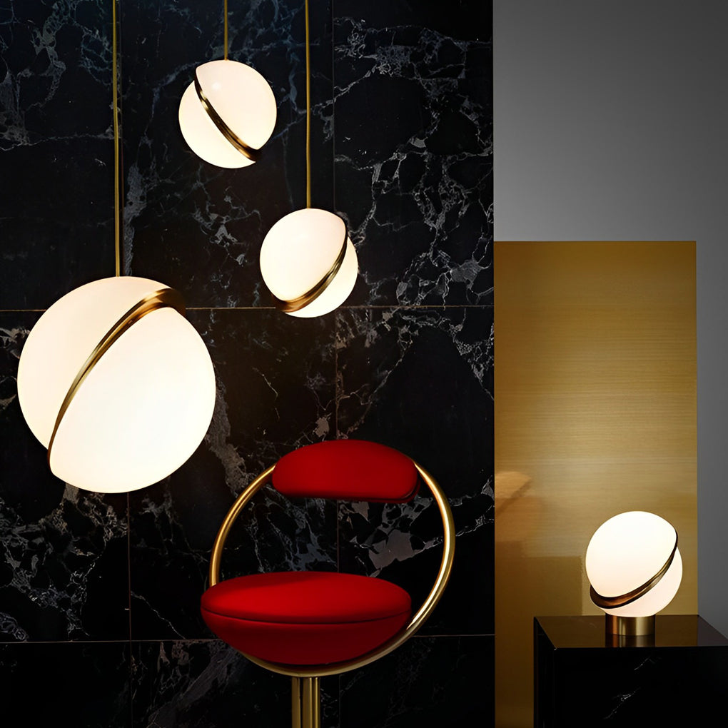 Modern White Spherical Pendant Light cluster with gold bands against a luxury marble wall.