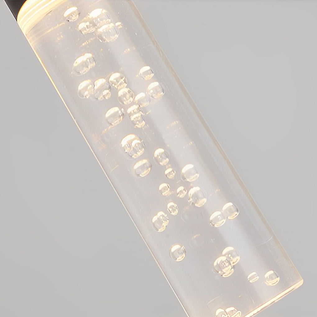 Macro close-up of seeded bubble glass texture for a luxury black LED cylinder pendant light.