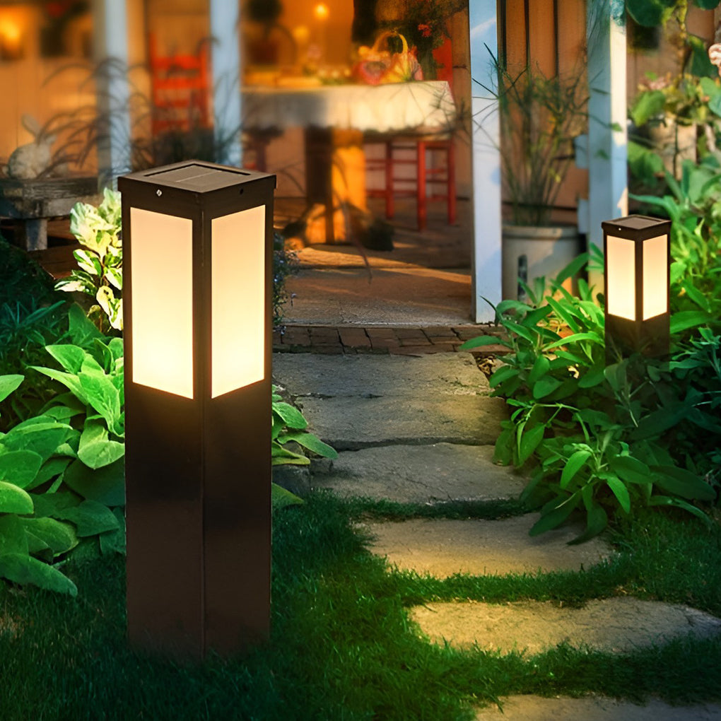 Mainstays bollard pathway light with detailed view of its solar panel and installation.