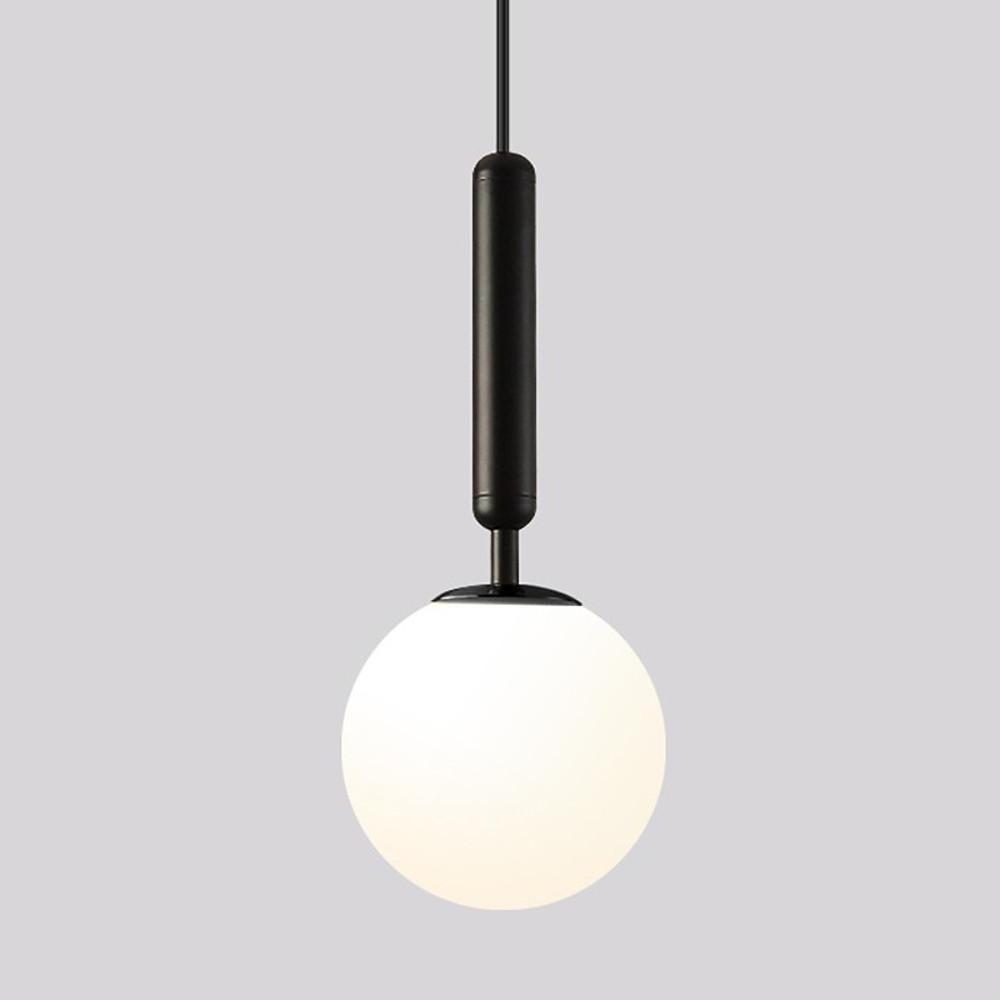 Modern gold hanging lights variant in matte black finish with a frosted glass orb shade.
