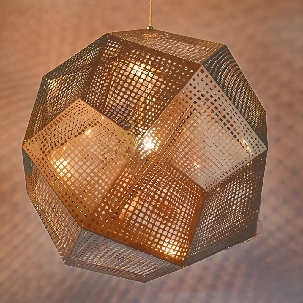 Warm-toned metal shade pendant light with geometric structure illuminated from within, shown as a product detail.