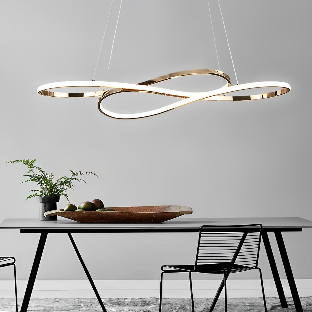 LED infinity chandelier with minimalist design above dining table and chairs.