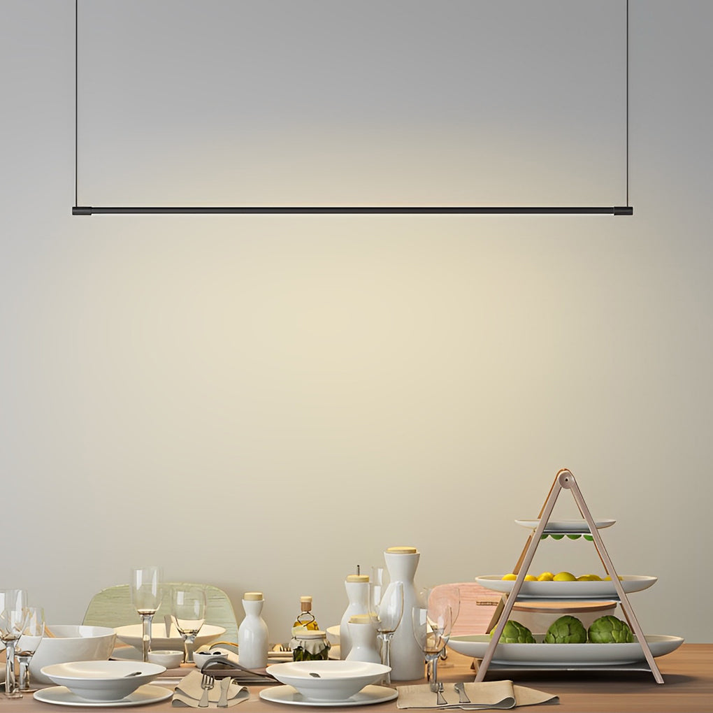 Minimalist linear pendant light fixture centered above dining table setting.
