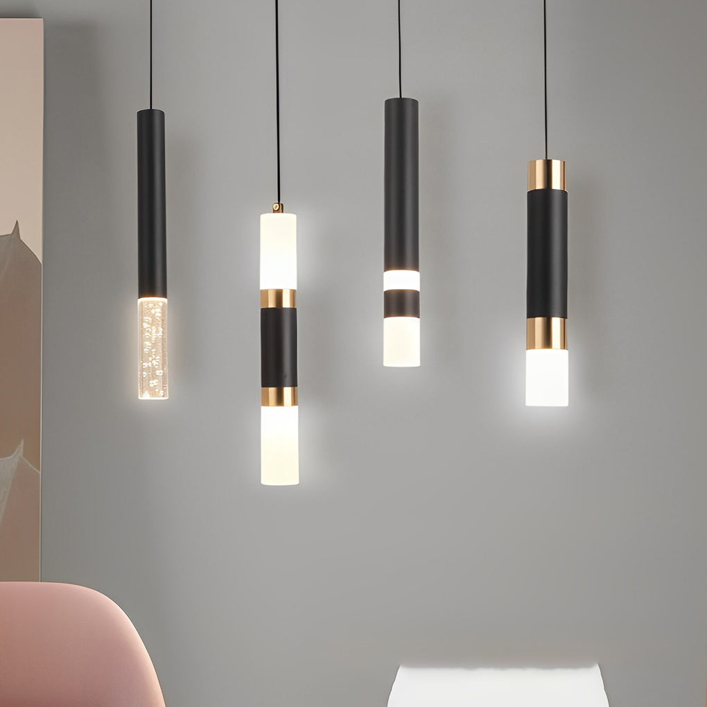 Mixed cluster of black LED cylinder pendant lights with bubble glass and frosted dual-light.