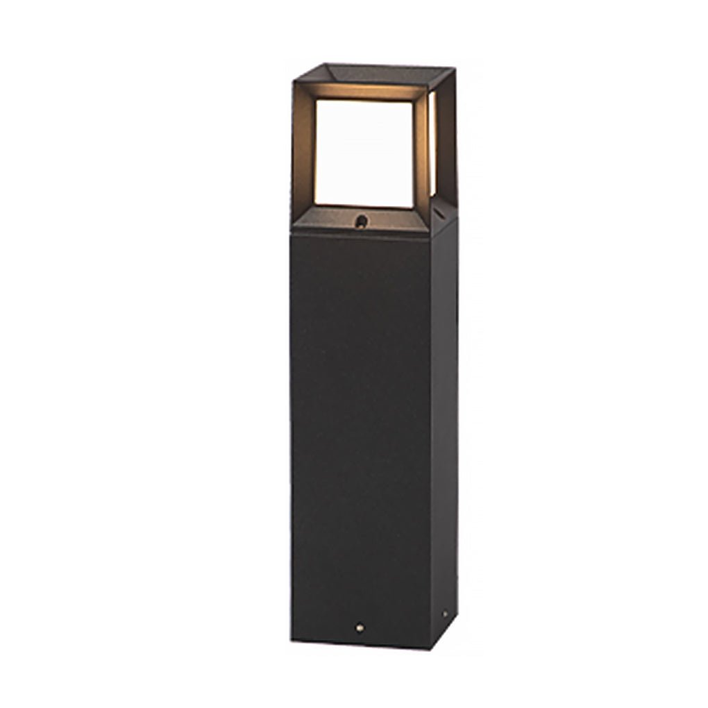 Modern black outdoor bollard lights with a warm glow isolated against a white studio background