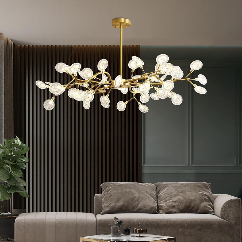 Modern firefly pendant light with multiple glass bulbs and brass finish.