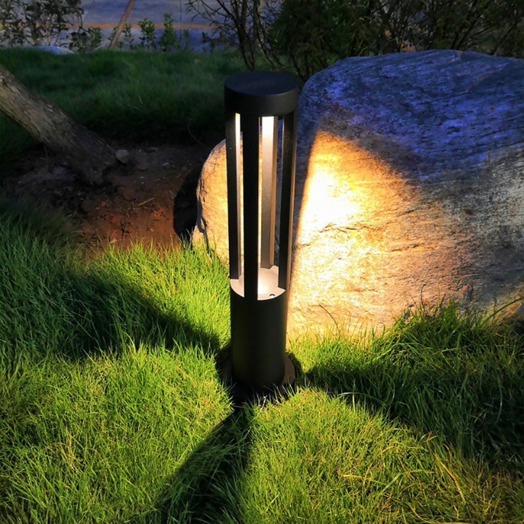 Modern outdoor bollard lights displayed in a row, showcasing their modern design.
