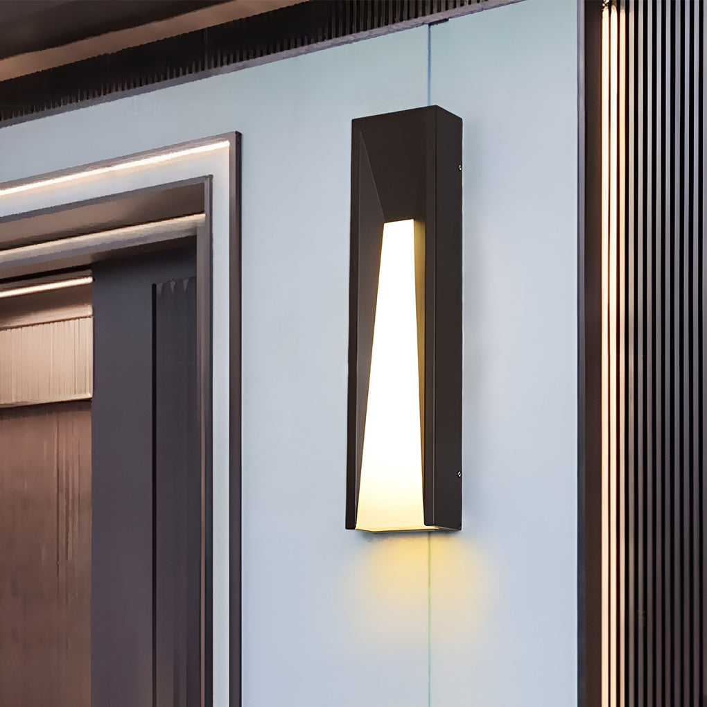 Modern outdoor wall light mounted beside exterior doorway