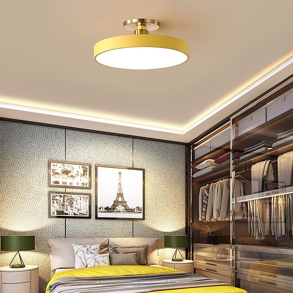 Modern semi flush mount ceiling lights casting a gentle glow in a chic walk-in closet.