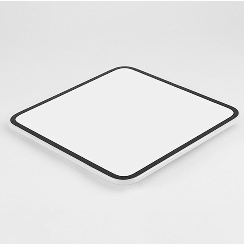 Modern square LED ceiling light with a black frame, providing ambient lighting.