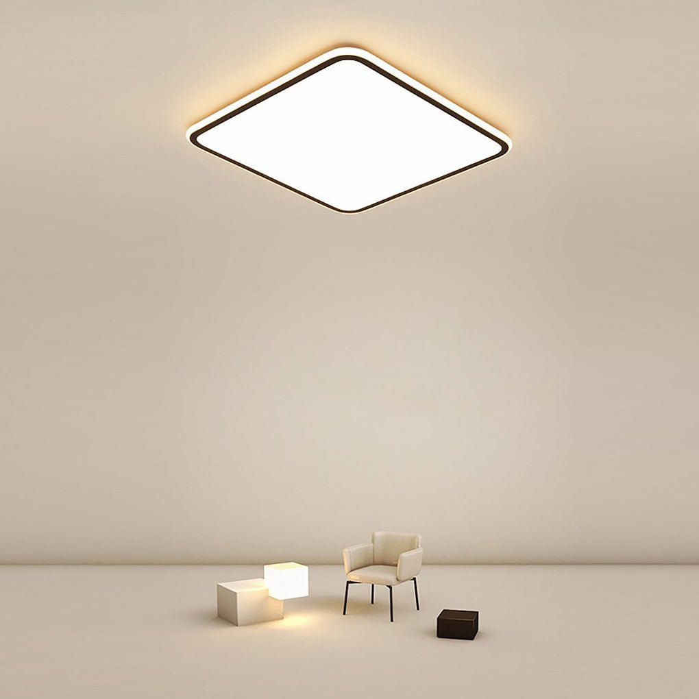 Modern square LED ceiling light illuminating a cozy living room with warm light.