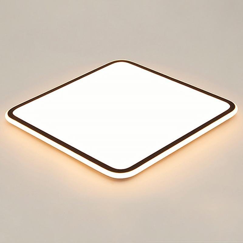 Modern square LED ceiling light with a white frame, enhancing a modern interior.