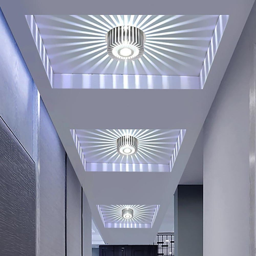 Modern sunburst ceiling fixture enhancing a stylish hallway with sleek, geometric design.