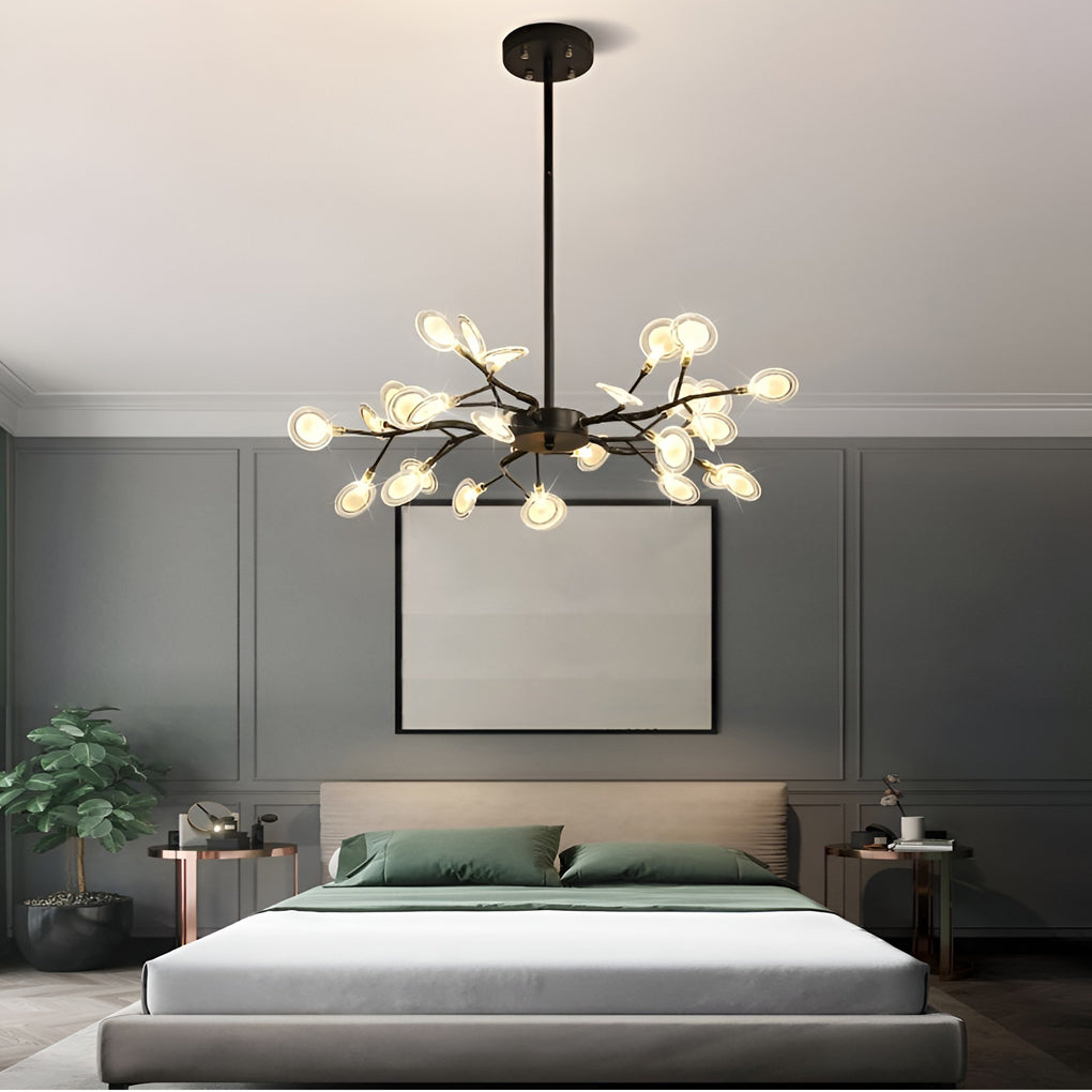 Modern tree branch chandelier enhancing a contemporary bedroom with artistic design.