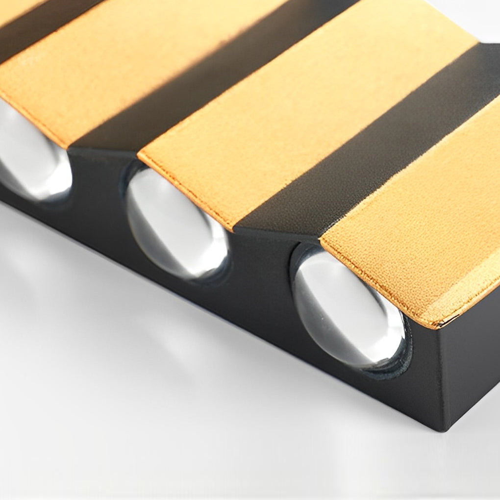 Modern up and down wall lights product detail showing black and gold finish with precise light outlets for outdoor use.