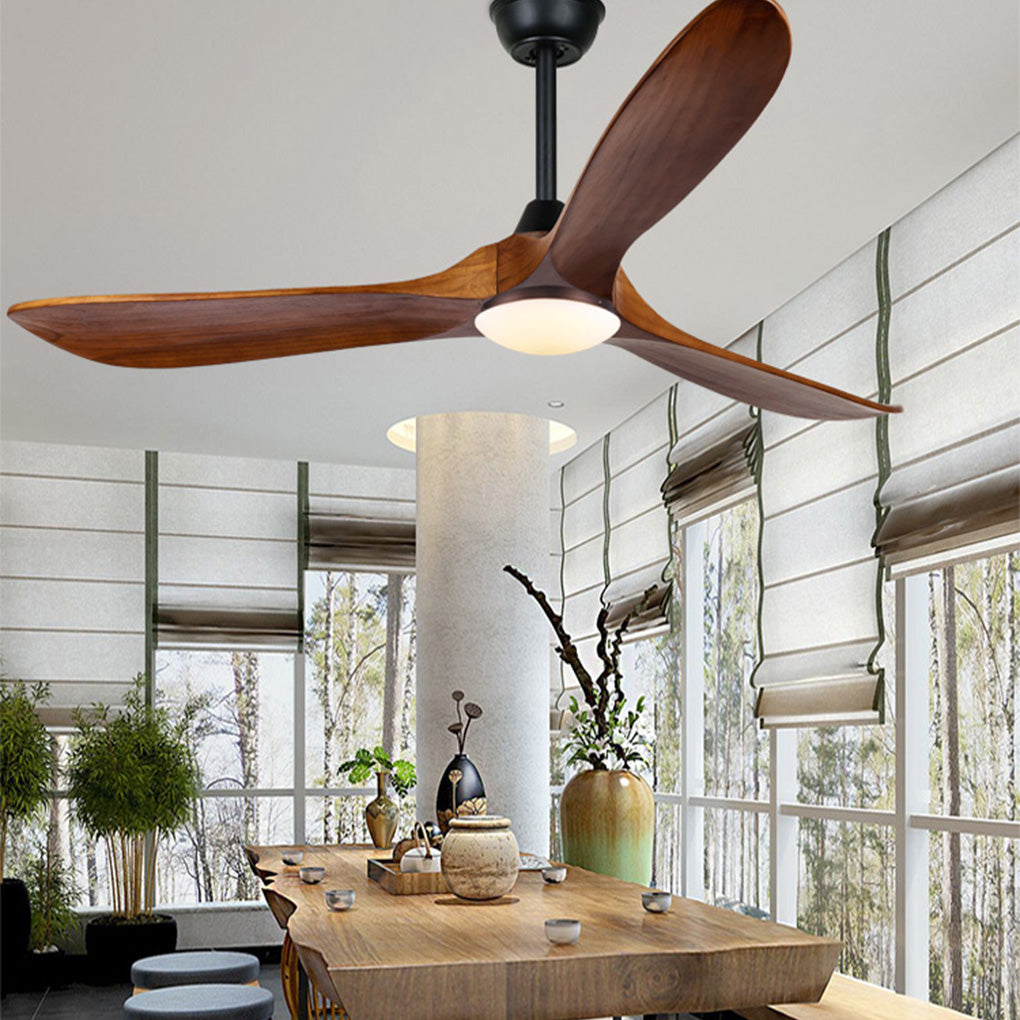Modern wood ceiling fan with light illuminating a contemporary living room.