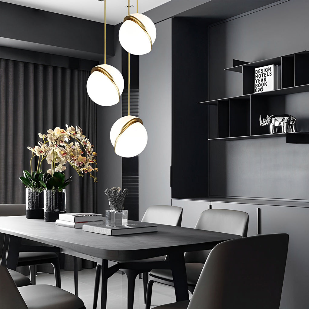 Stunning White Spherical Pendant Light cluster above a black dining table in a moody room.