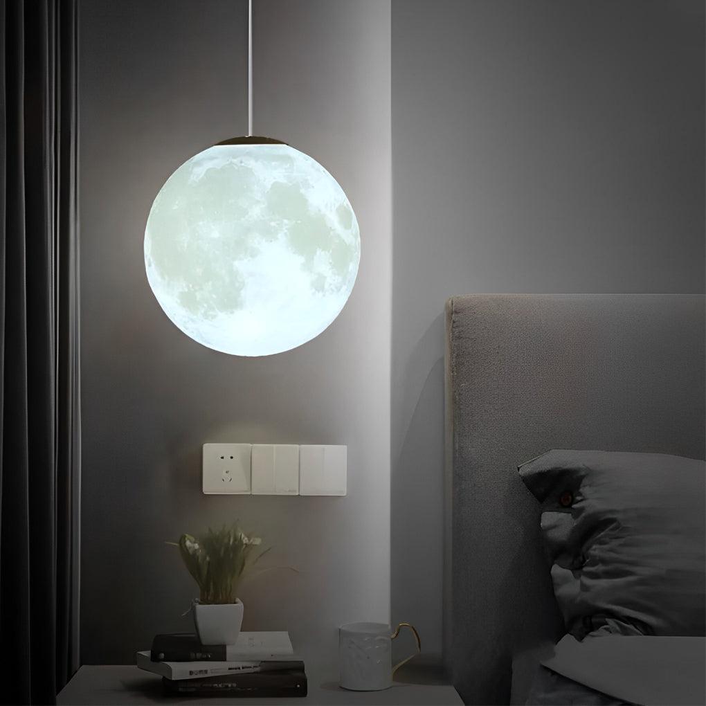 Warm amber moon globe light placed on floor as ambient decor lighting.