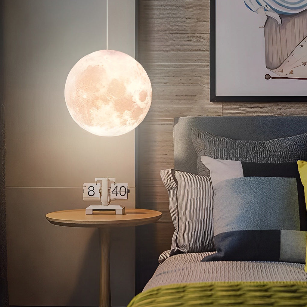 Moon globe pendant light hanging alone with minimal background.