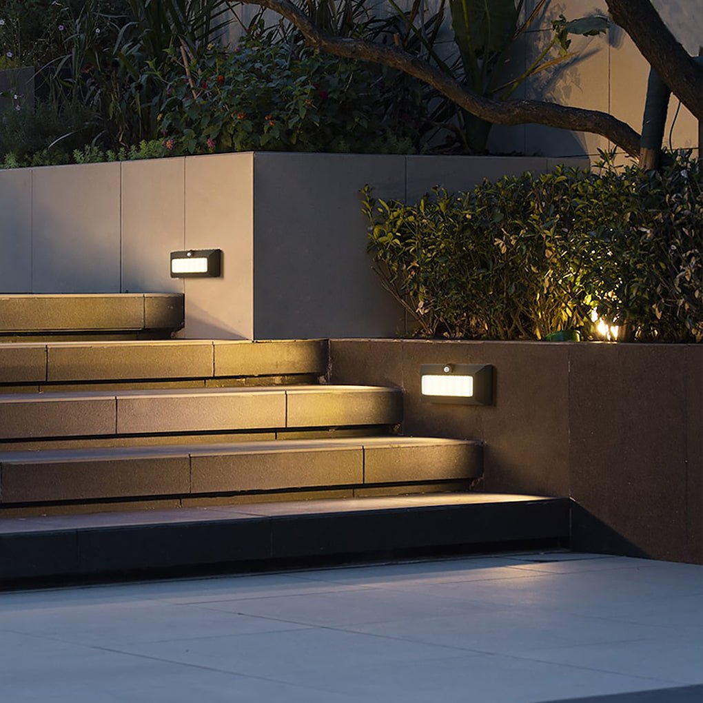 Motion sensor LED step lights providing safety lighting on stone steps.