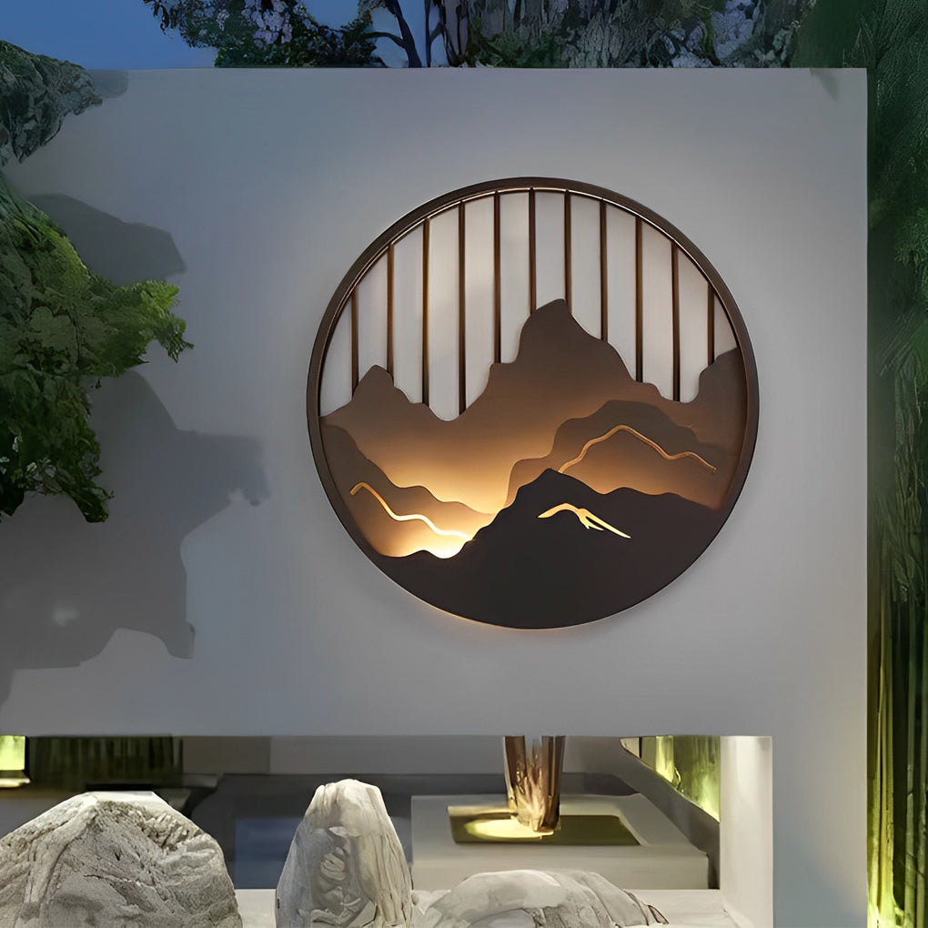 Decorative mountain LED wall light used in minimalist outdoor courtyard.