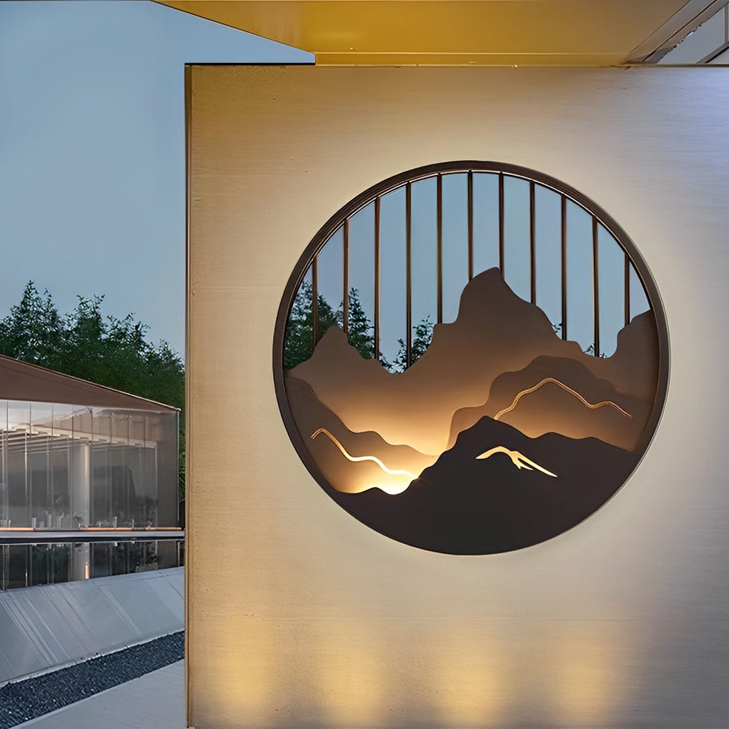 Mountain LED wall light installed on outdoor wall highlighting layered mountain silhouette.