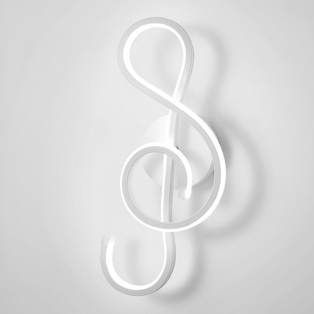 Musical note wall light with a close-up of the treble clef light fixture.