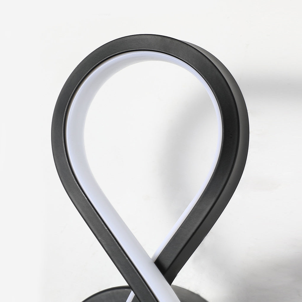 Musical note wall light in white, front view of the modern treble clef design.