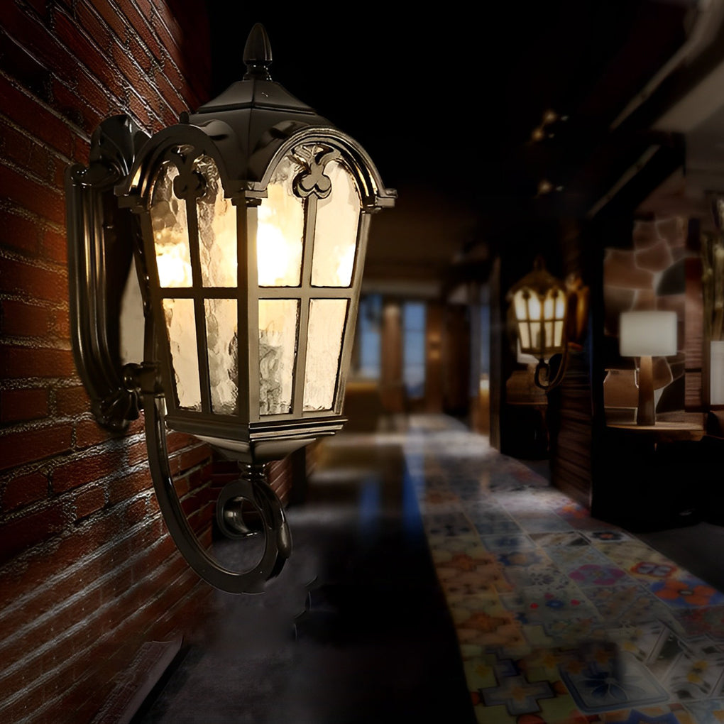 Outdoor black sconce mounted near a doorway, providing ambient lighting for a welcoming entrance.