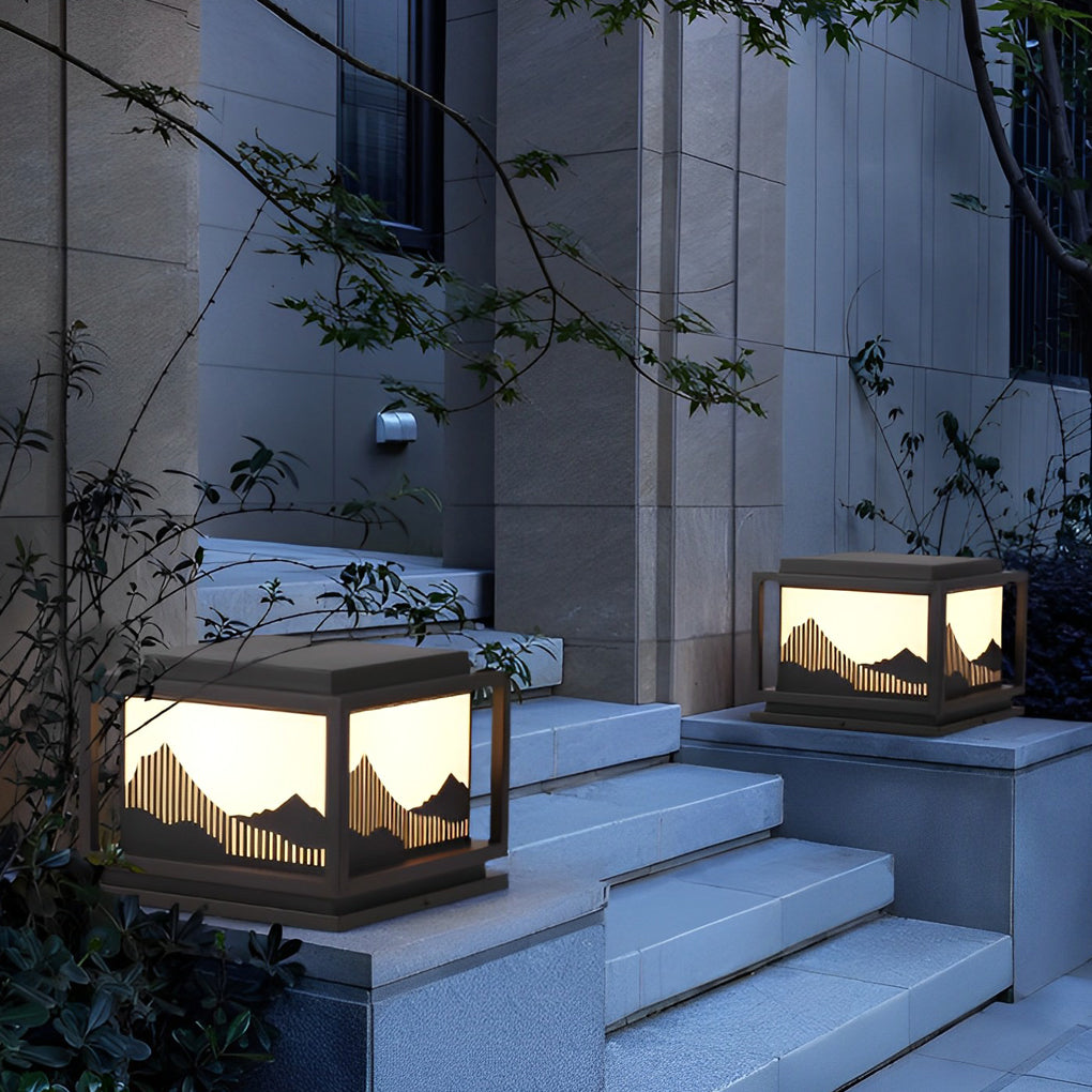 Outdoor brick pillar lights providing elegant illumination for a contemporary landscape.