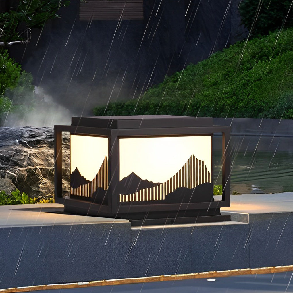 Outdoor brick pillar lights enhancing a modern outdoor seating area with warm light.