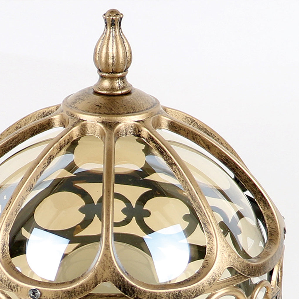 Outdoor globe pillar lights with a gold geometric design, displayed on a white surface for clarity.