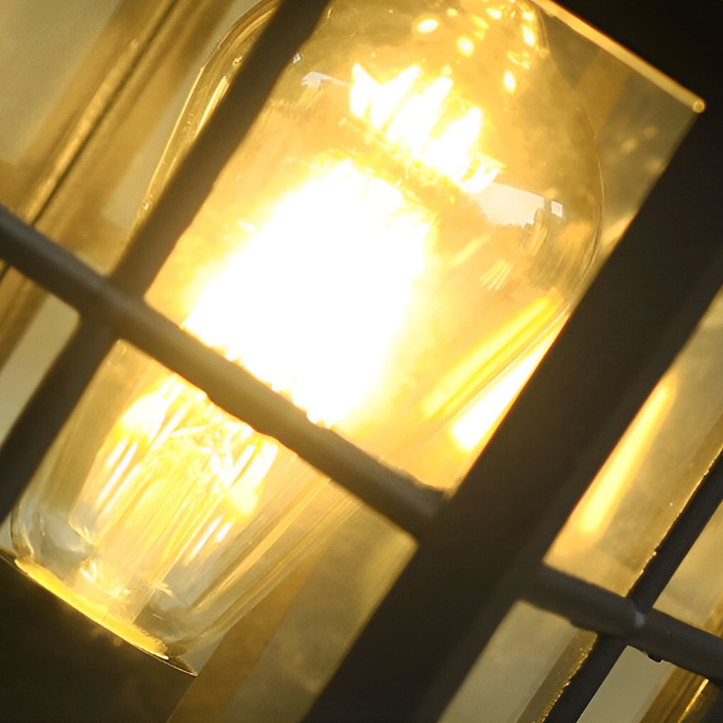 Outdoor lawn lights with a detailed view of their glass panels and sturdy structure.