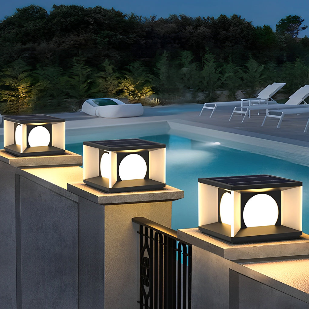 Outdoor pillar light enhancing a modern poolside area with warm light.