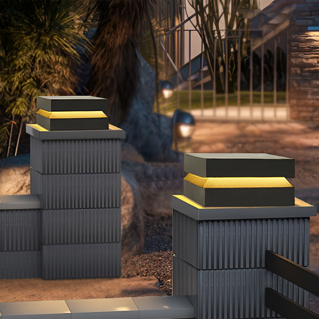 Outdoor solar lights deck with stacked design, illuminating waterfront walkway.